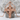 Archangel Michael halo cross pendant, rose gold plated, front view on stone