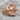 Adam Skull Ring, rose gold, product photo on rock surface