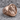 Good Shepherd Cross Ring, rose gold, angled product photo on stone
