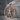 Vitruvian Man Frame Pendant, rose gold, product photo on stone surface
