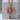 Gothic Skull Cross Pendant, rose gold, product photo on stone block