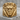 Horned Oni Ring, gold vermeil, front view on stone display