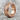 Japanese Scale Ring, rose gold, angled product photo on stone