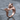 Climbing Cat Wrap Ring, rose gold finish, angled front view on stone