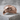 Eagle Beak Ring, rose plated silver, side profile on stone block