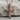 Braided Rope Cross Pendant, rose gold, front view on stone