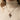 Model wearing handcrafted red enamel mushroom pendant necklace on sterling silver chain over cream turtleneck