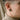 Hittite Sun Disk Earring, worn on model's ear