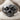 Zombie Skull Ring, black rhodium, front product view on fabric