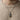 Model wearing oxidized silver Ganesha pendant necklace over a sweater for a spiritual daily wear style