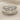 Lydian Coin Ring, polished, product view on fabric