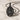 Saint Barbara Pendant, black rhodium, angled view on marble surface