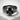 Low Profile Skull Band Ring, black rhodium, front product view on concrete