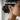 Side profile view of woman wearing elegant teardrop lace drop earrings showcasing dark romantic styling