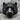 Tiger Face Ring, black rhodium, front view on rock surface
