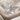 Praying Cherub Ring, polished silver, angled front view on fabric