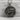 Athenian Owl Coin Pendant, oxidized silver, product photo against stone