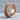 Beaded Fleur-de-lis Cross Ring, rose gold, angled view on stone