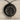 Ouroboros Tree Pendant, black rhodium, front product view on stone