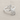 Rose bypass ring in polished silver, product photo on fabric
