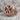Chi Rho Signet Ring, rose gold, angled front view on stone