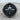 Compass Skull Ring, black rhodium plated, front view on wood