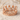 Royal Crown Ring, rose gold, product view resting on sand