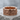 Celtic Knot Lion Ring, rose gold plated, front view on stone surface