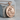 Saint Anne Pendant, rose gold, product photo on stone