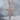 Dimpled Texture Cross Pendant, rose gold finish, front view on stone
