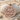 Gemini Zodiac Medallion Pendant, rose gold, front view on stone and sand