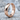 Faceted Geometric Hoop Earring, rose gold, product photo on stone