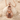 Horus Falcon Pendant, rose gold, front view on seashell