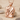 Doctor Coat Pendant, rose gold, product photo on sand
