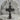 Saint Benedict Crucifix Pendant, gold vermeil, product photo on stone base