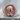 Virgin Mary Profile Ring, rose gold finish, front view on stone surface