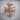 Baroque cross ring, rose gold plated finish on wood background