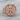 Dextera Dei Signet Ring, rose gold finish, front product view on wood surface