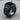 Koi Onyx Signet Ring, black rhodium, product photo on wood surface