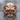 Square Compass Masonic Skull Ring, rose gold, front view on stone