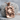 Scroll Skull Pendant, rose gold, product view on stone