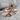 Airplane star wrap ring in rose gold, front view on stone