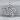 Quaternary Celtic Knot Pendant, polished, product photo on stone surface
