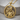 Flowing Hair Virgo Zodiac Pendant, gold vermeil, product photo on wood