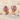 October Tourmaline Bud Stud Earring, rose gold, product photo on sand