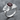 Garnet Camellia Frame Ring, polished silver, angled studio product photo