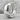 Cracked Hoop Earring, polished, product photo on rock surface