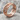 Twisted Barbed Wire Ring, rose gold, product photo on stone