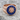 Hammered Masonic Blazing Star Ring, rose gold plated, angled view on stone
