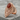 Masonic Archer Ring, rose gold, product photo on stone pedestal